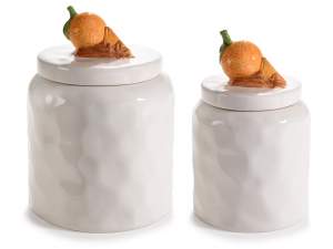 Ceramic jar with orange and cinnamon decorations