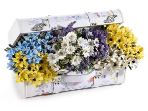 Wholesaler of white wooden suitcases decorated wit