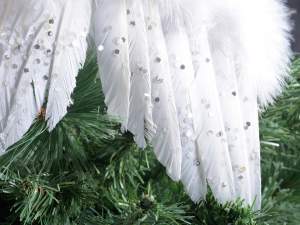 Entrance with angel wings and tree decoration