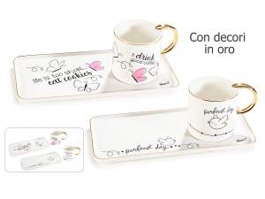 Tasse et soucoupe en gros avec décorations en or