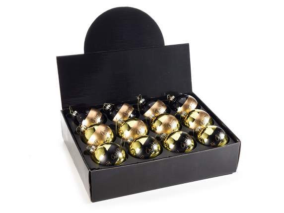 Boule en verre coloré avec des décorations de paillettes dor