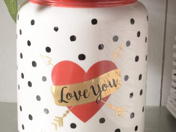 Glossy ceramic container with glossy gold-like decorations