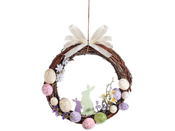 Couronne en bois avec oeufs, lapins et noeud à suspendre