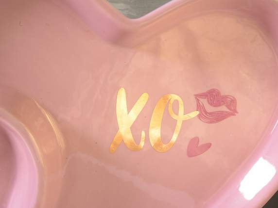 Decorative ceramic plate with shiny gold-like decorations