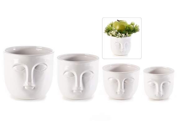 Set of 4 ceramic vases with face decoration