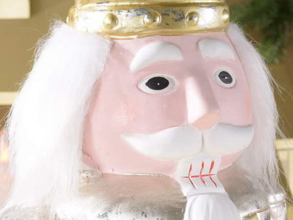 Personaje Cascanueces en resina blanca-dorada con luces LED