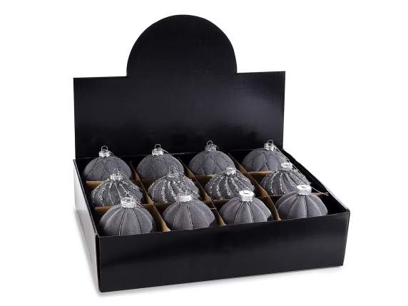 Gray velvet ball with glitter decorations in display