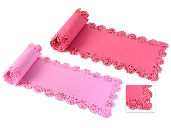 Cloth table runner with edges decorated with roses