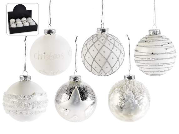 Glass ball with glitter decorations and beads in display