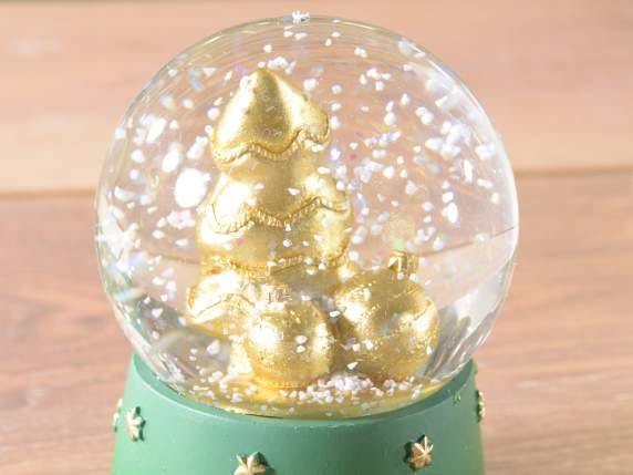 Angel snowball on a resin base with golden decorations