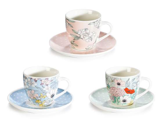 Porcelain coffee cup with saucer and floral decoration