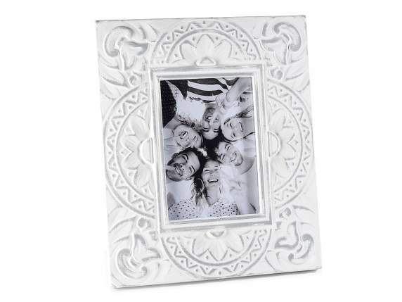 Wooden photo frame to stand with decorations in relief