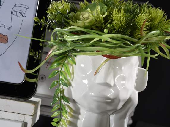 Hammered effect face-shaped porcelain vase