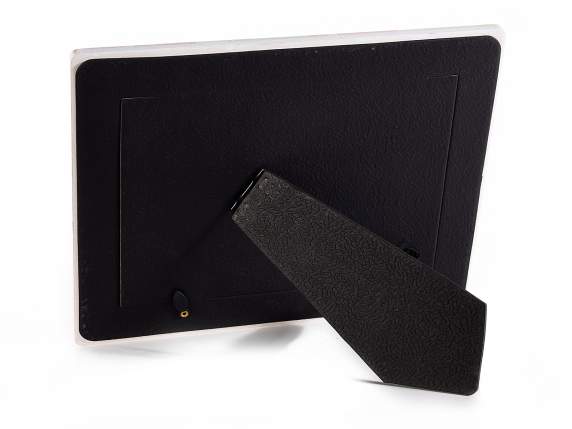 Glossy ceramic photo frame to place floral decorations
