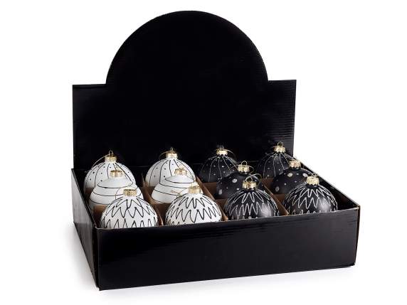 Glass ball to hang with shiny gold-like decorations on displ