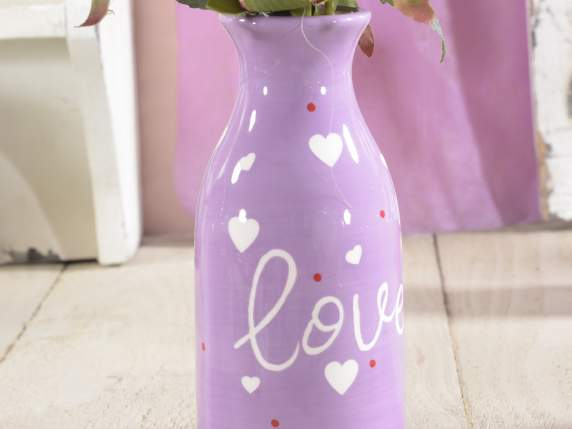 Colored ceramic jar with Love writings and decorations