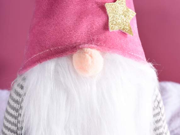Long legged Santa Claus with golden star to rest