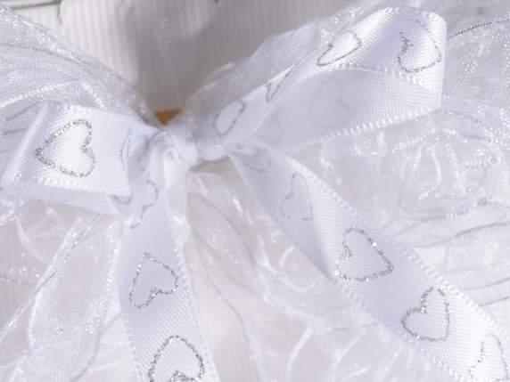 White satin ribbons with glittered silver hearts