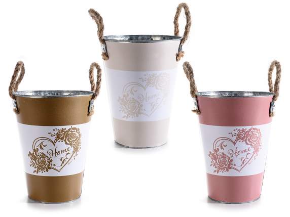 Metal vase with rope handles and heart decoration