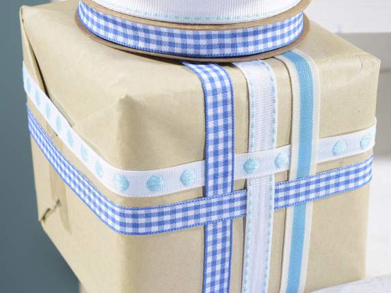 Set of 5 light blue-white ribbons in multiple paper roll
