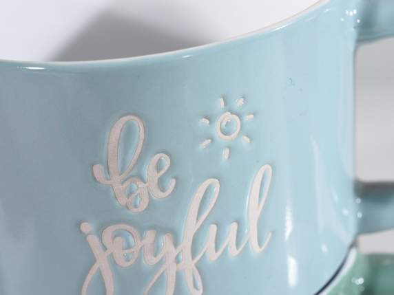 Be Joyful colored ceramic mug with carvings