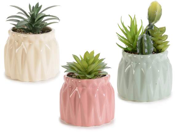 Colored glossy ceramic pot with artificial seedling