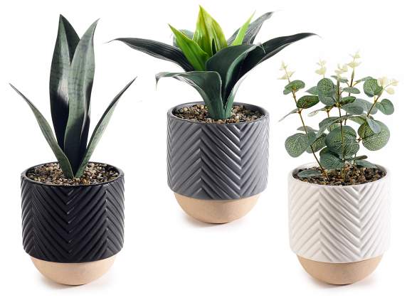 Knurled ceramic vase with artificial plant