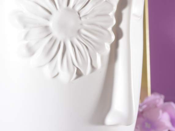 Opaque porcelain vase with face in relief