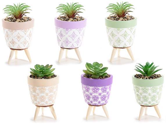 Cement vase decorated with artificial plant and wooden tripo