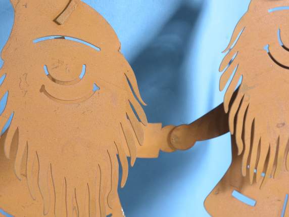Row of garden gnomes in corten effect metal