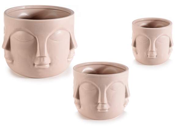 Set of 3 natural colored ceramic vases with face decoration