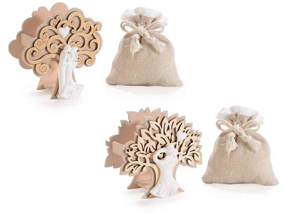 Wooden tree of life with plaster couple and bag